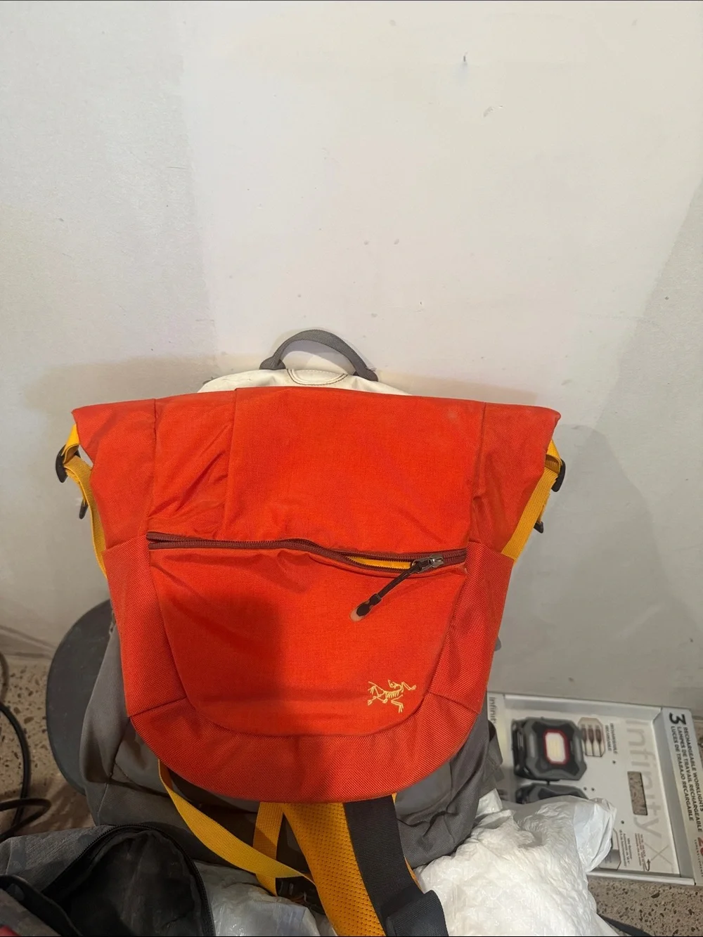 Arc'teryx Red Backpack with Yellow Accents